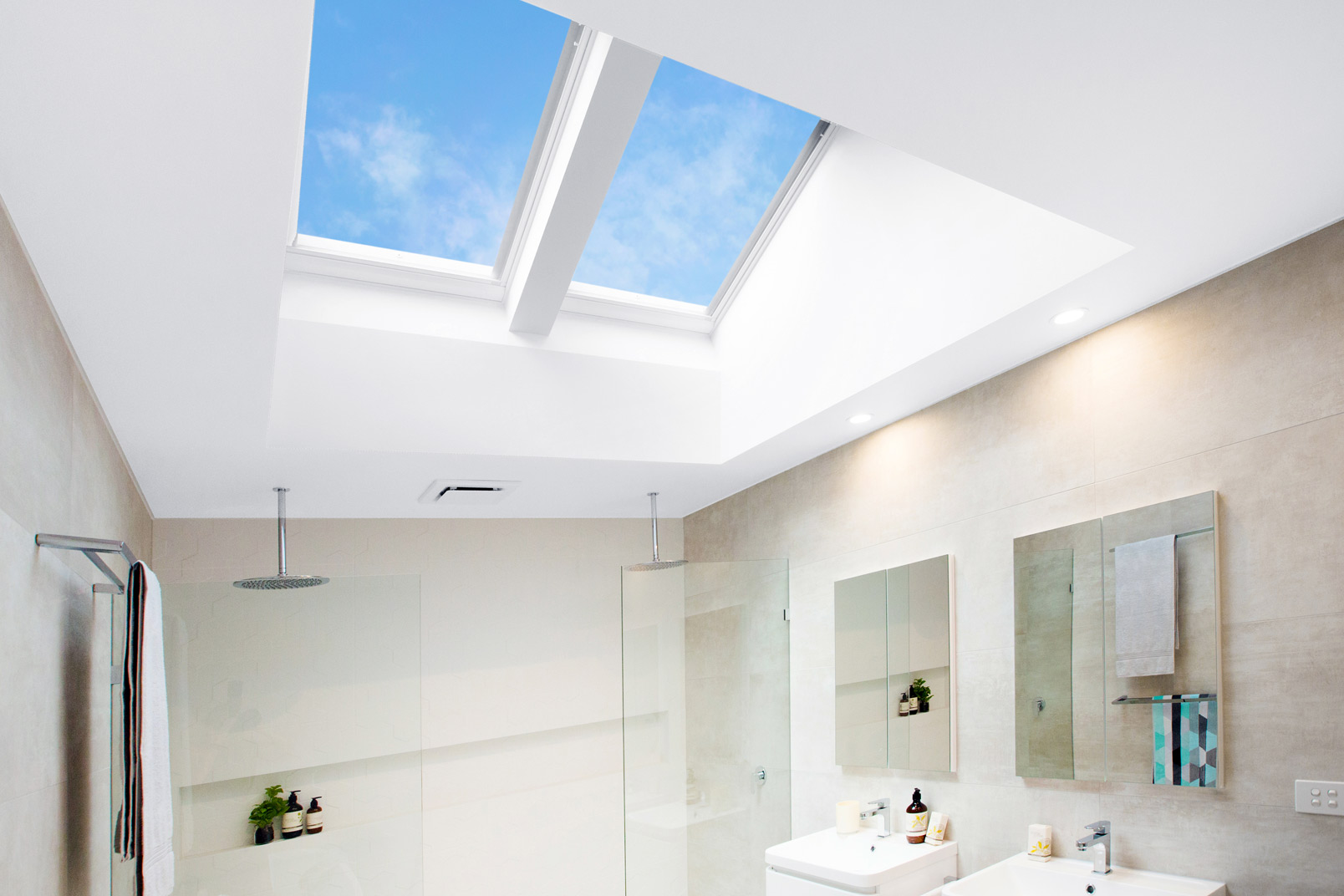 skylights in bathroom with white interior in auckland